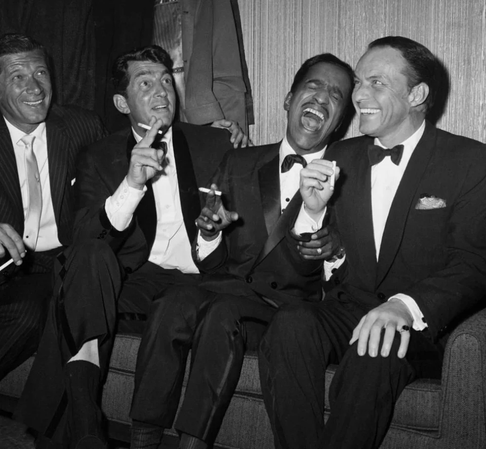 What It’s Like Staying at Caesars Palace Las Vegas - Still Cool? 5 Rat Pack - Peter Lawford, Dean Martin, Sammy Davis Jr. and Frank Sinatra laugh together